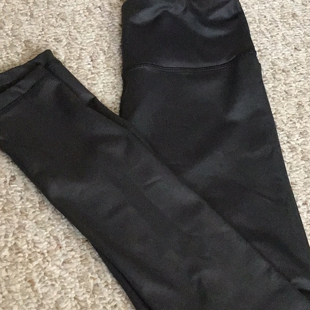 Green shiny leggings